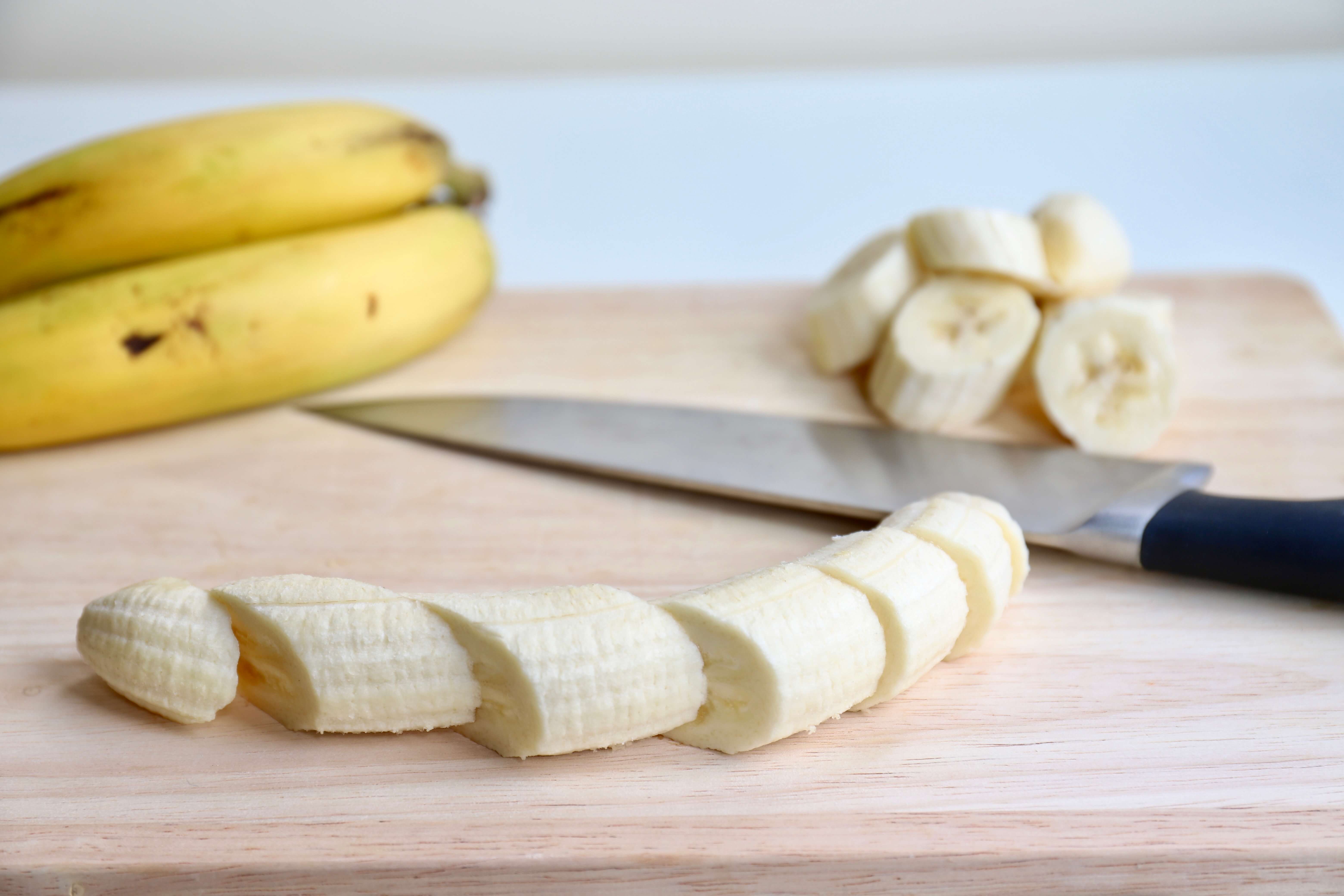 sliced banana on a chopping board