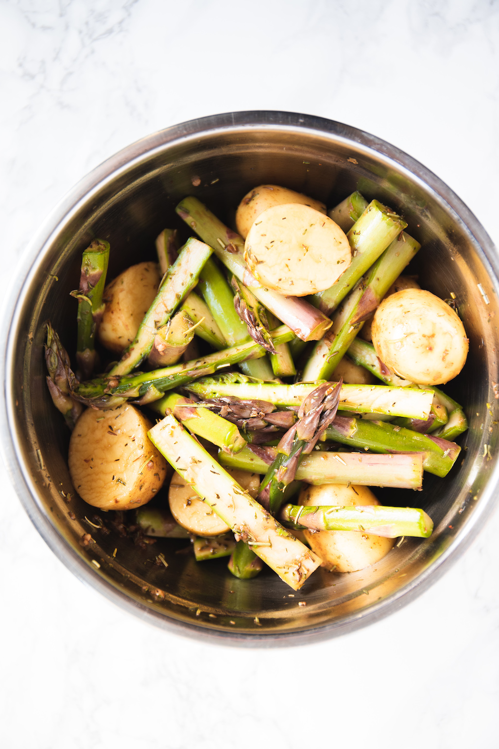 Potatoes and asparagus in a bowl