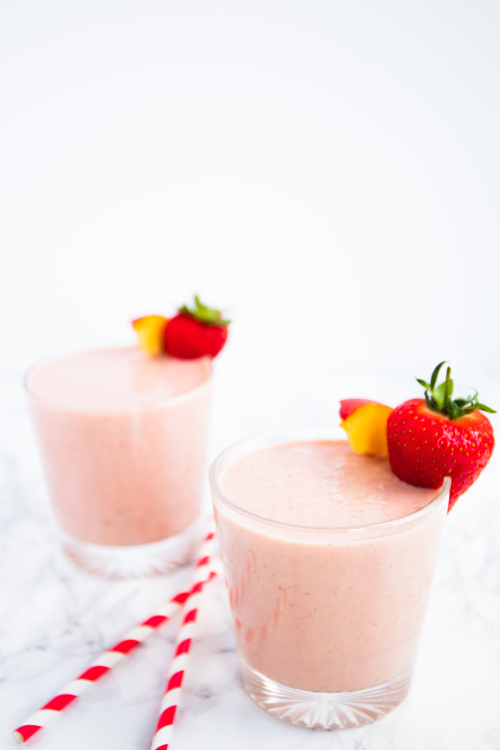 https://www.spoonfulofkindness.com/wp-content/uploads/2019/05/strawberry-peach-smoothie-2.jpg
