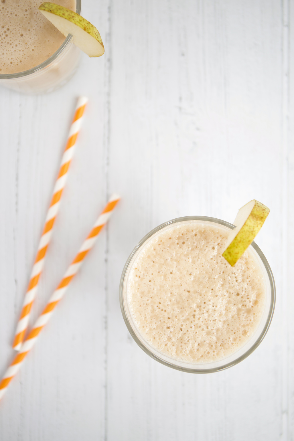 two glasses of pear smoothie