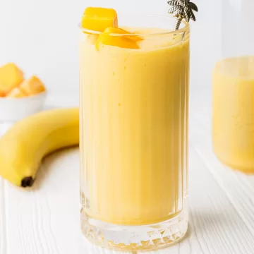 coconut mango smoothie in a glass